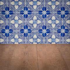 Image showing Wood table top and blur vintage ceramic tile pattern wall