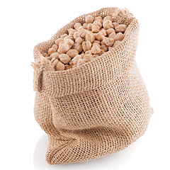 Image showing Uncooked chickpeas on burlap bag