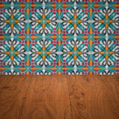 Image showing Wood table top and blur vintage ceramic tile pattern wall