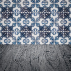 Image showing Wood table top and blur vintage ceramic tile pattern wall