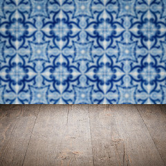 Image showing Wood table top and blur vintage ceramic tile pattern wall