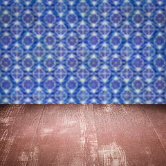 Image showing Wood table top and blur vintage ceramic tile pattern wall