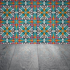 Image showing Wood table top and blur vintage ceramic tile pattern wall