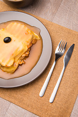 Image showing Francesinha and french fries