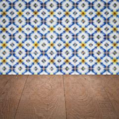 Image showing Wood table top and blur vintage ceramic tile pattern wall