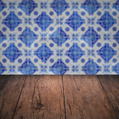 Image showing Wood table top and blur vintage ceramic tile pattern wall