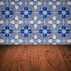 Image showing Wood table top and blur vintage ceramic tile pattern wall