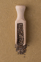 Image showing Wooden scoop with chia seeds