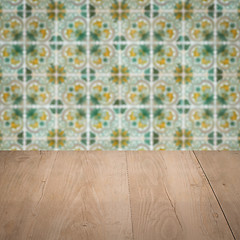 Image showing Wood table top and blur vintage ceramic tile pattern wall