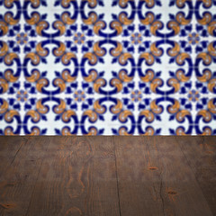 Image showing Wood table top and blur vintage ceramic tile pattern wall