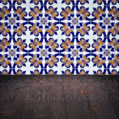 Image showing Wood table top and blur vintage ceramic tile pattern wall