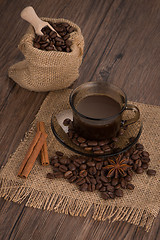 Image showing Coffee cup with burlap sack