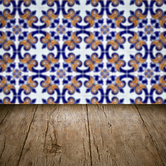 Image showing Wood table top and blur vintage ceramic tile pattern wall