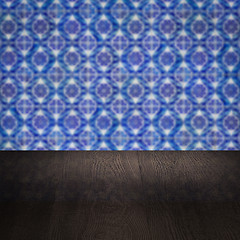 Image showing Wood table top and blur vintage ceramic tile pattern wall