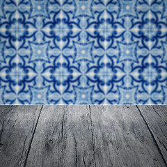 Image showing Wood table top and blur vintage ceramic tile pattern wall