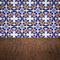 Image showing Wood table top and blur vintage ceramic tile pattern wall