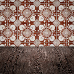 Image showing Wood table top and blur vintage ceramic tile pattern wall