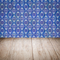 Image showing Wood table top and blur vintage ceramic tile pattern wall