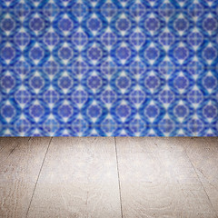 Image showing Wood table top and blur vintage ceramic tile pattern wall