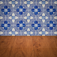 Image showing Wood table top and blur vintage ceramic tile pattern wall