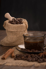 Image showing Coffee cup with burlap sack