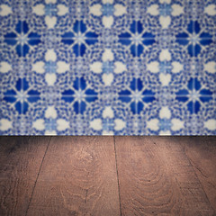 Image showing Wood table top and blur vintage ceramic tile pattern wall