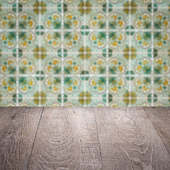 Image showing Wood table top and blur vintage ceramic tile pattern wall