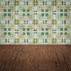 Image showing Wood table top and blur vintage ceramic tile pattern wall