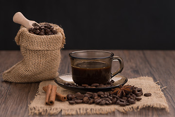 Image showing Coffee cup with burlap sack