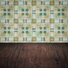 Image showing Wood table top and blur vintage ceramic tile pattern wall