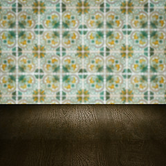 Image showing Wood table top and blur vintage ceramic tile pattern wall