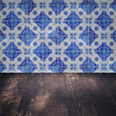 Image showing Wood table top and blur vintage ceramic tile pattern wall