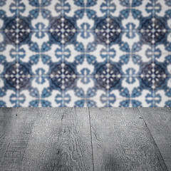 Image showing Wood table top and blur vintage ceramic tile pattern wall