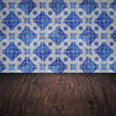 Image showing Wood table top and blur vintage ceramic tile pattern wall