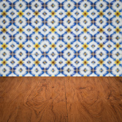 Image showing Wood table top and blur vintage ceramic tile pattern wall