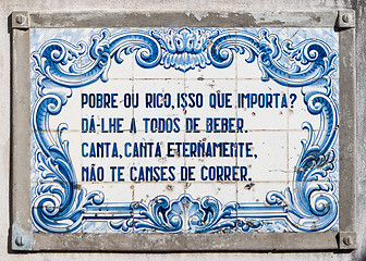 Image showing Panel of traditional Portuguese tiles hand-painted blue and whit