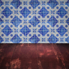 Image showing Wood table top and blur vintage ceramic tile pattern wall