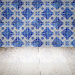 Image showing Wood table top and blur vintage ceramic tile pattern wall