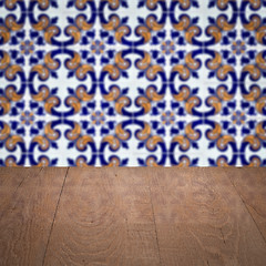 Image showing Wood table top and blur vintage ceramic tile pattern wall