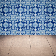 Image showing Wood table top and blur vintage ceramic tile pattern wall