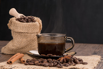 Image showing Coffee cup with burlap sack