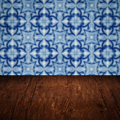 Image showing Wood table top and blur vintage ceramic tile pattern wall