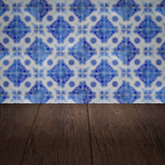 Image showing Wood table top and blur vintage ceramic tile pattern wall