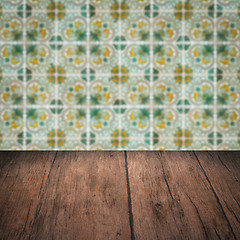 Image showing Wood table top and blur vintage ceramic tile pattern wall