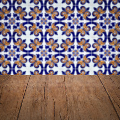 Image showing Wood table top and blur vintage ceramic tile pattern wall