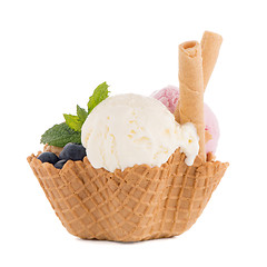 Image showing Ice cream scoops in wafer bowl