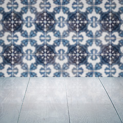 Image showing Wood table top and blur vintage ceramic tile pattern wall