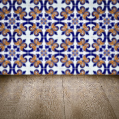 Image showing Wood table top and blur vintage ceramic tile pattern wall