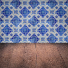 Image showing Wood table top and blur vintage ceramic tile pattern wall