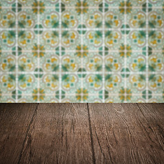 Image showing Wood table top and blur vintage ceramic tile pattern wall